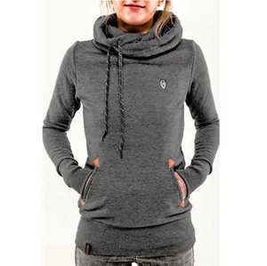 Close-up detail of women's dark grey cowl neck hoodie featuring a small wolf head embroidery