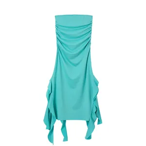 Close-up detail view of a turquoise strapless mini dress featuring ruching and ruffled hem