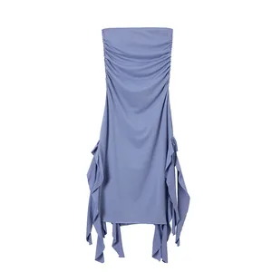 Detail view of periwinkle blue ruched tube dress with irregular ruffled hemline