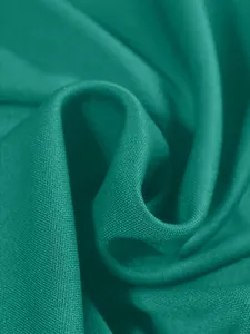 Primo piano della trama del tessuto verde acqua spesso per la giacca della tuta sportiva