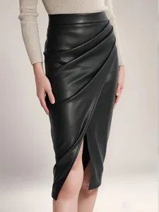 Elegant black high-waisted PU leather midi skirt with slit and draped pleated detail