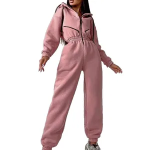 Women's dusty pink hooded long sleeve jumpsuit with elastic waist and zipper pockets