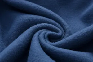 Macro detail of high-quality soft blue fleece lining for a warm autumn hoodie garment
