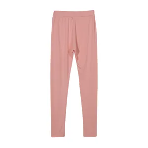 Detail showing the back of pink high-waisted solid color sports leggings for women