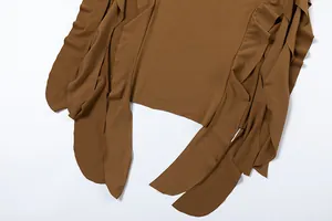 Close-up detail showing the ruffled irregular hem of this coffee brown bodycon dress