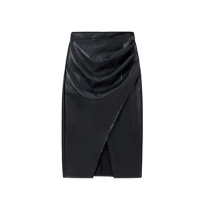 Elegant black PU leather midi skirt featuring stylish asymmetrical front pleats and a subtle front slit