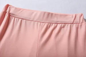 Detailed view of the soft pink elastic waistband on casual women sports trousers
