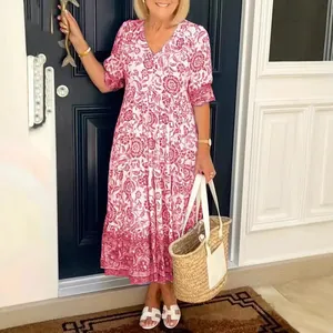 Elegant floral print maxi dress for women with V-neck and loose bohemian tiered style