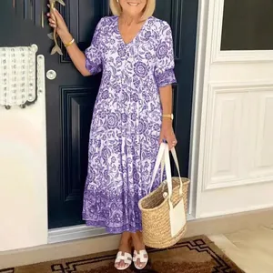 Elegant purple floral print maxi dress with V-neck and loose bohemian style for summer