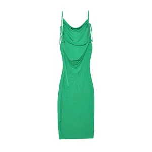 Detail of sexy green backless dress with adjustable side drawstrings and thin straps