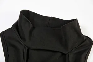 Macro detail shot showing the mock neck and hollow cutout design of a black bodycon dress