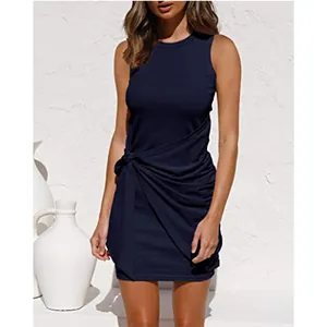 Detail view of navy blue sleeveless ruched mini dress with knotted waist detail