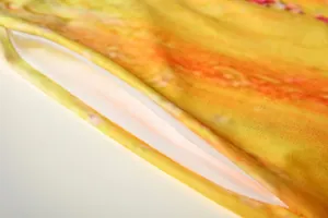 Close-up detail of retro floral print fabric and pocket lining on a sleeveless maxi dress.