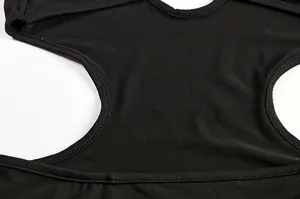 Macro view of black sexy hollow halter dress showing high-quality fabric texture.