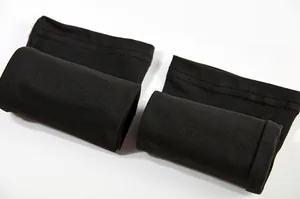 Close-up view of solid black elastic fabric sleeves featuring fine double stitching detail
