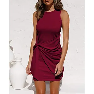 Detail view of wine red sleeveless crew neck ruched dress with tie-waist knot