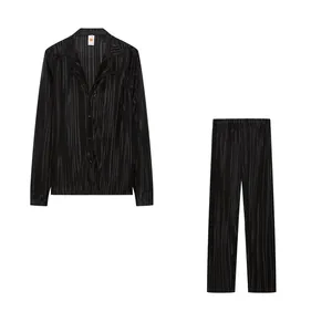 Elegant black two-piece pleated shirt and pants set featuring a loose casual fit design