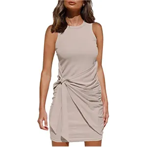 Detail of sleeveless crew neck ruched dress with waist bow and asymmetrical hem