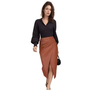 Elegant high-waist brown PU leather wrap skirt featuring ruched details and a sexy side slit.