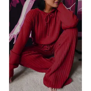 Cozy red ribbed knit hooded sweatshirt and matching wide-leg lounge pants for women