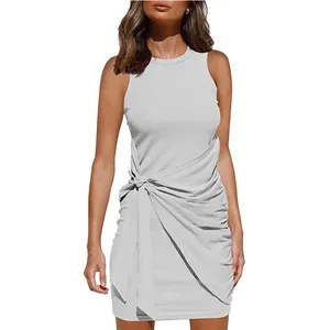 Detailed view of grey sleeveless ruched mini dress with tie-waist bow and irregular hem