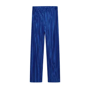 Close-up detail of elegant royal blue metallic pleated loose-fit trousers for women