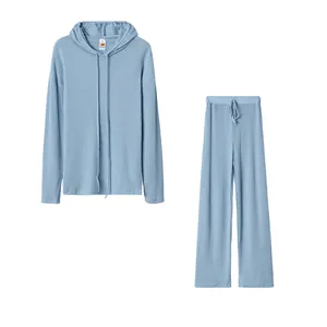 Detailed view of light blue ribbed lounge set with long-sleeved hoodie and wide-leg pants