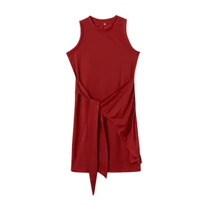 Wine red sleeveless dress with waist tie belt and asymmetrical pleated hem details
