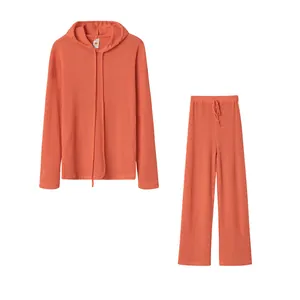 Cozy coral ribbed knit lounge set featuring hooded long sleeve top and wide-leg pants