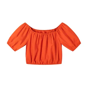 Haut court orange vif à épaules dénudées avec manches bouffantes et ourlet élastique