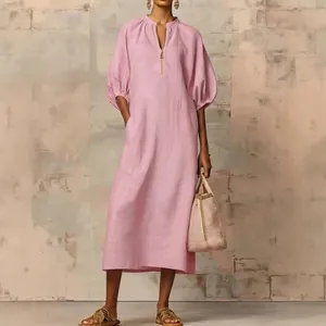 Elegant pink cotton-linen puff sleeve maxi dress with a minimalist zipper V-neck design