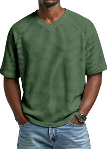 Detailed view of olive green men's waffle knit T-shirt featuring a V-neck and raglan sleeves