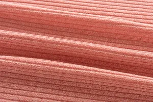 Detailed macro shot showing the premium pink ribbed knit fabric texture for casual apparel