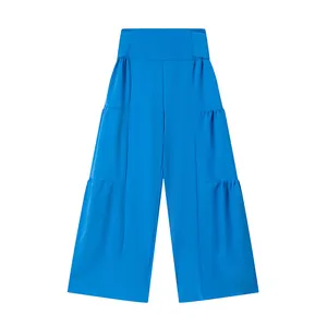 Vue de face du pantalon large bleu vif à taille haute avec empiècements élastiques