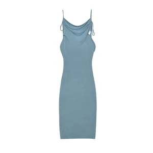 Detail view of a blue cowl neck bodycon dress with elegant shoulder tie straps.