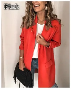 Detailed view of a vibrant orange-red women's casual long sleeve blazer with fake pockets