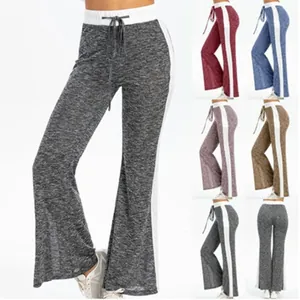 High-waisted flared lounge pants with side stripes and drawstring in multiple colors
