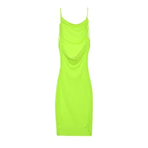 Macro view of neon green bodycon dress with draped cowl neck and side drawstrings.