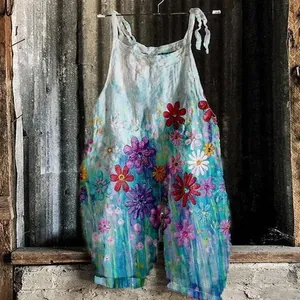 Vintage women's wide-leg jumpsuit featuring a vibrant colorful floral print for summer wear