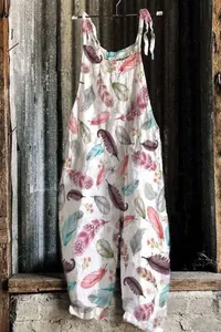 Detail view of colorful feather print on vintage summer wide-leg jumpsuit