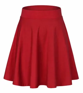 Close-up of bright red high-waisted A-line skater skirt showing soft knit fabric