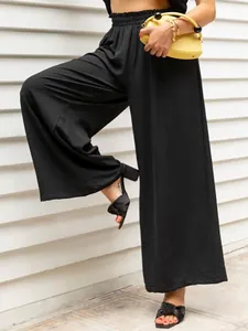 Detailed close-up of high waisted wide leg linen pants for women in black casual style