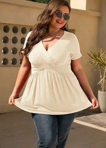 Plus size women's V-neck tunic top in beige with short sleeves for summer