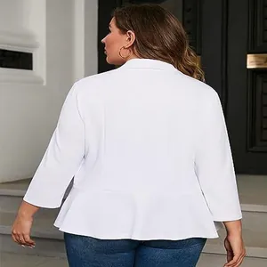 Back view of elegant white plus-size peplum blazer showing the stylish ruffle hem detail