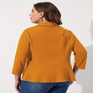 Back view of a modern mustard yellow plus-size blazer with ruffle hem and 3/4 sleeves