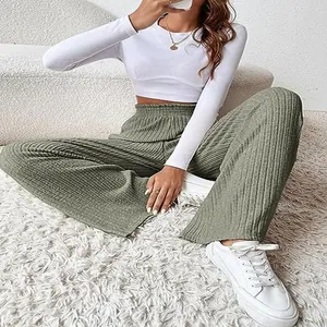 Close-up of olive green ribbed knit wide-leg pants for a cozy casual look