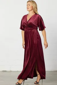 Elegant plus size burgundy velvet maxi dress with V-neckline and high slit detail
