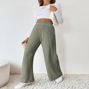 Sage green high-waisted ribbed knit wide-leg pants for women in a cozy lifestyle setting.