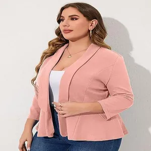 Detail of plus size casual pink blazer with elegant ruffle hem and peplum silhouette