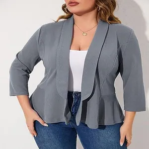 Frontal detail view showing the draped shawl collar of a grey plus size peplum blazer